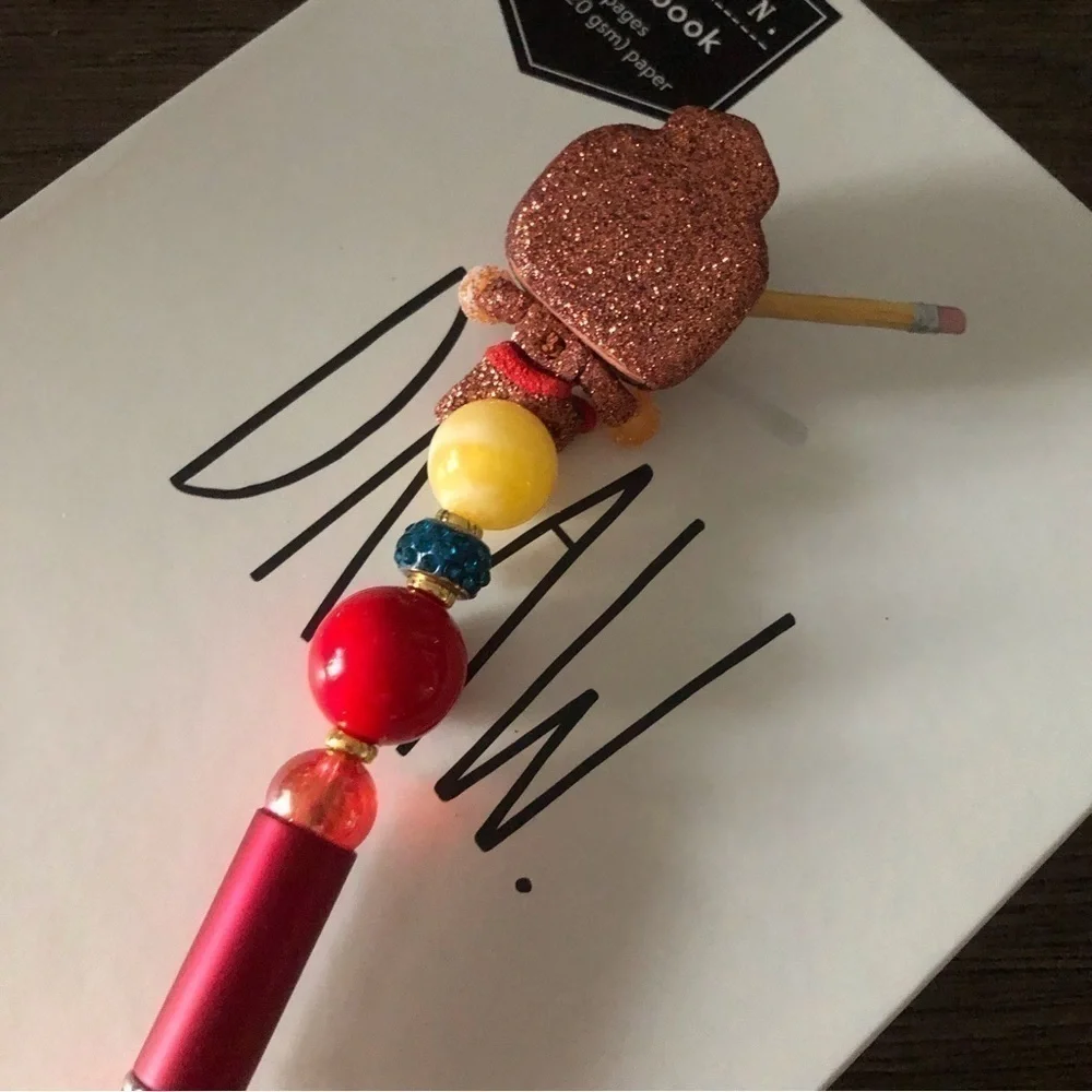 Marvel Gingerbread man handmade beaded pen: Ms. Marvel Glitter